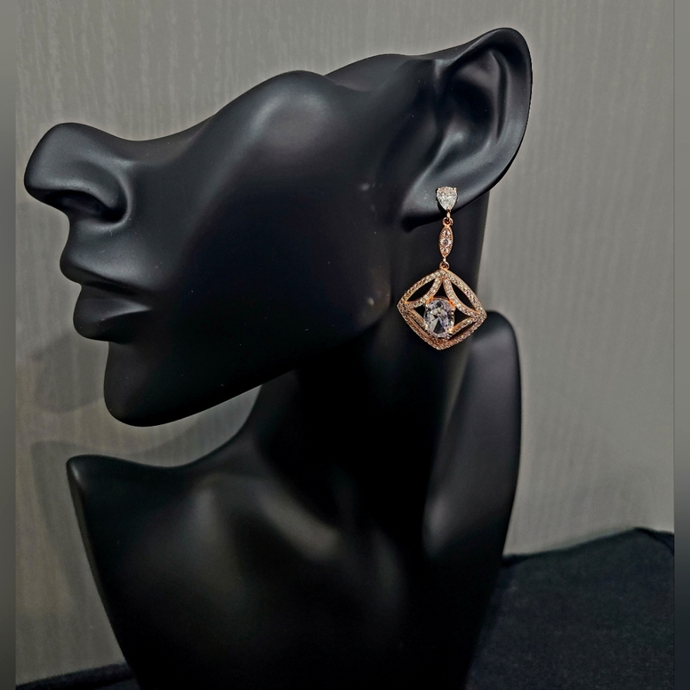 Givenchy gold earrings with beautiful stones. Great gift for anyone!